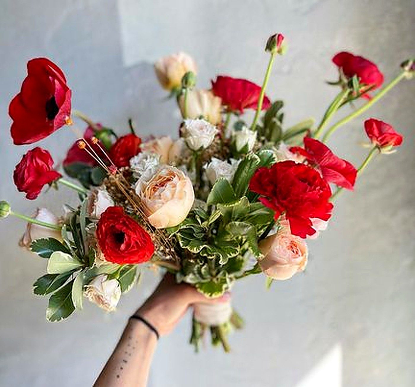 Bridal bouquet & handheld florals